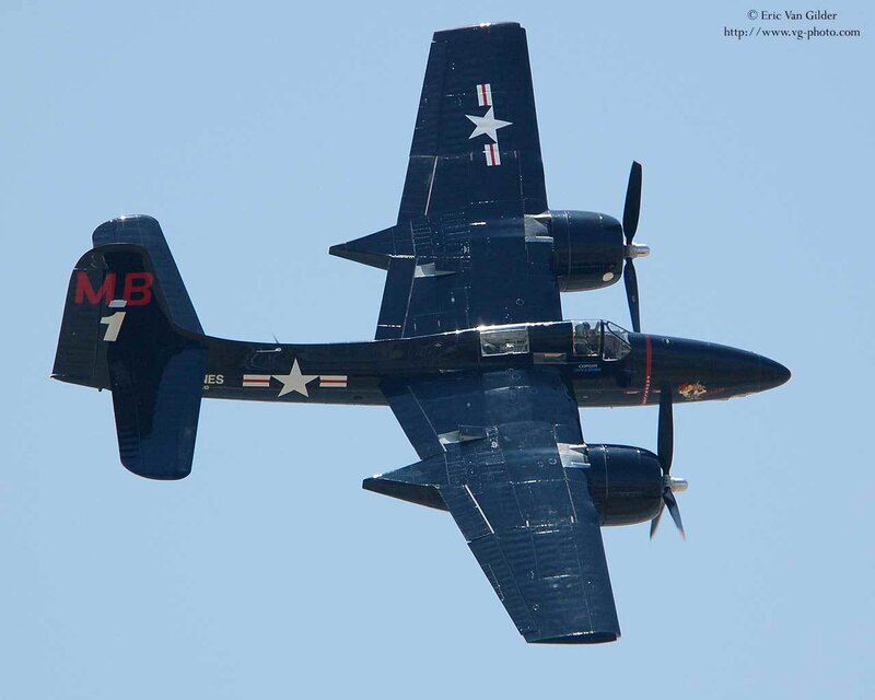 Black Military Aircraft — Blue, Clear, Afternoon