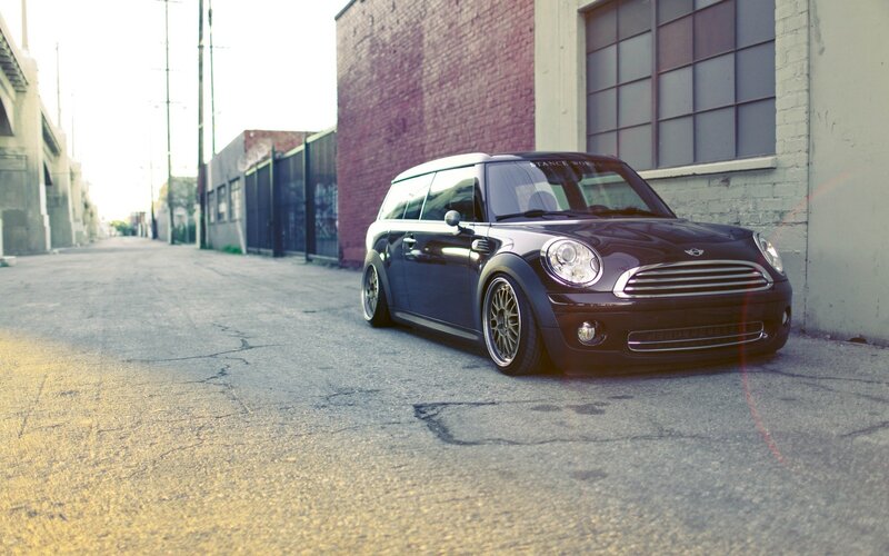 black mini cooper in alley