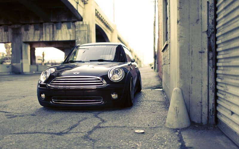 black mini cooper in alley