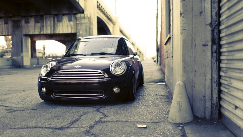 black mini cooper in alley