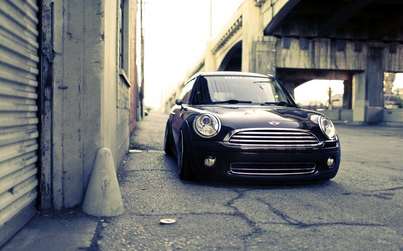 black mini cooper in alley