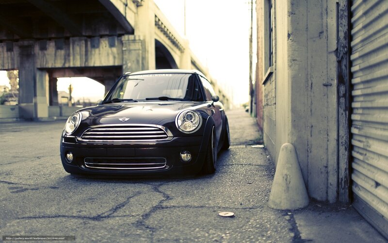 Black Mini Cooper in alley