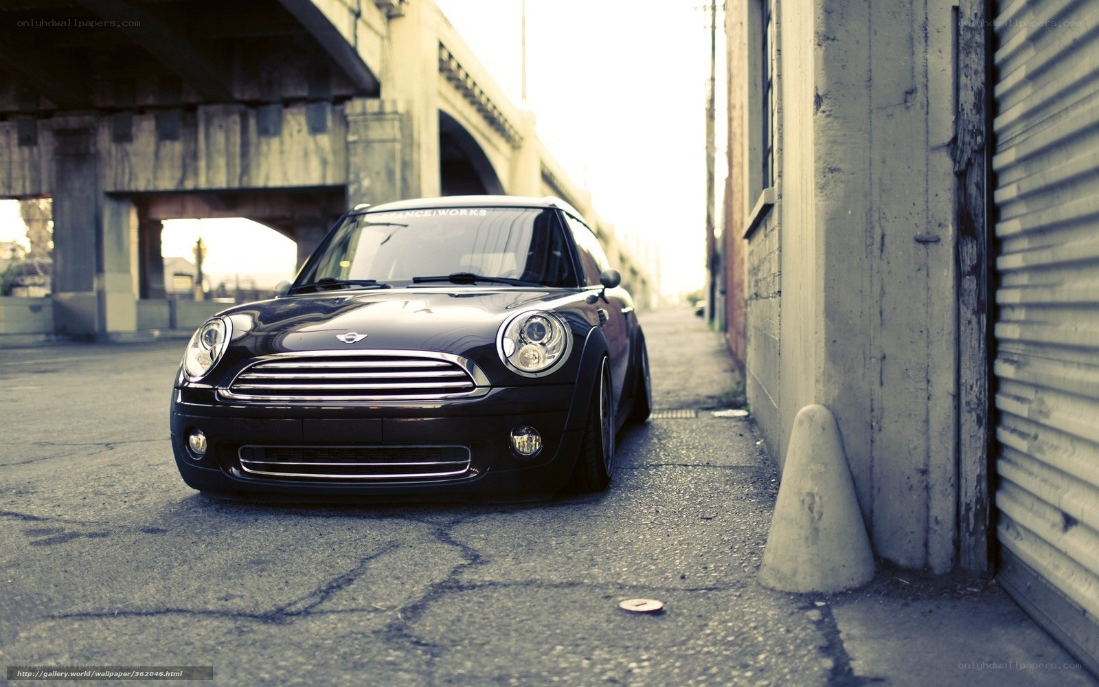 Black Mini Cooper in alley