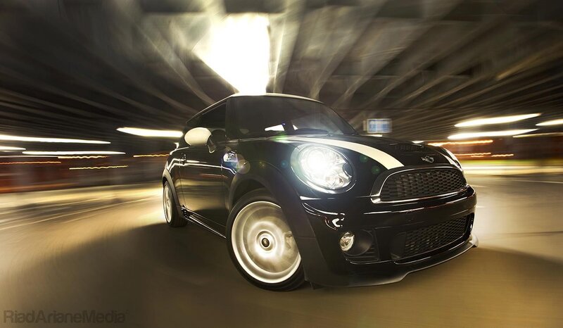 Black Mini Cooper in motion
