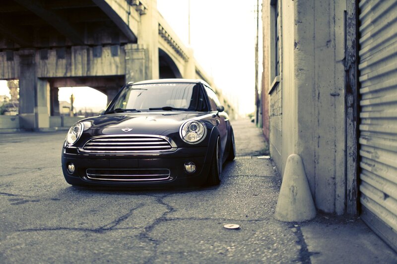 Black Mini Cooper in urban alley
