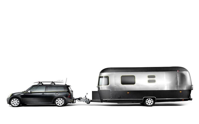 Black Mini Cooper Towing Trailer