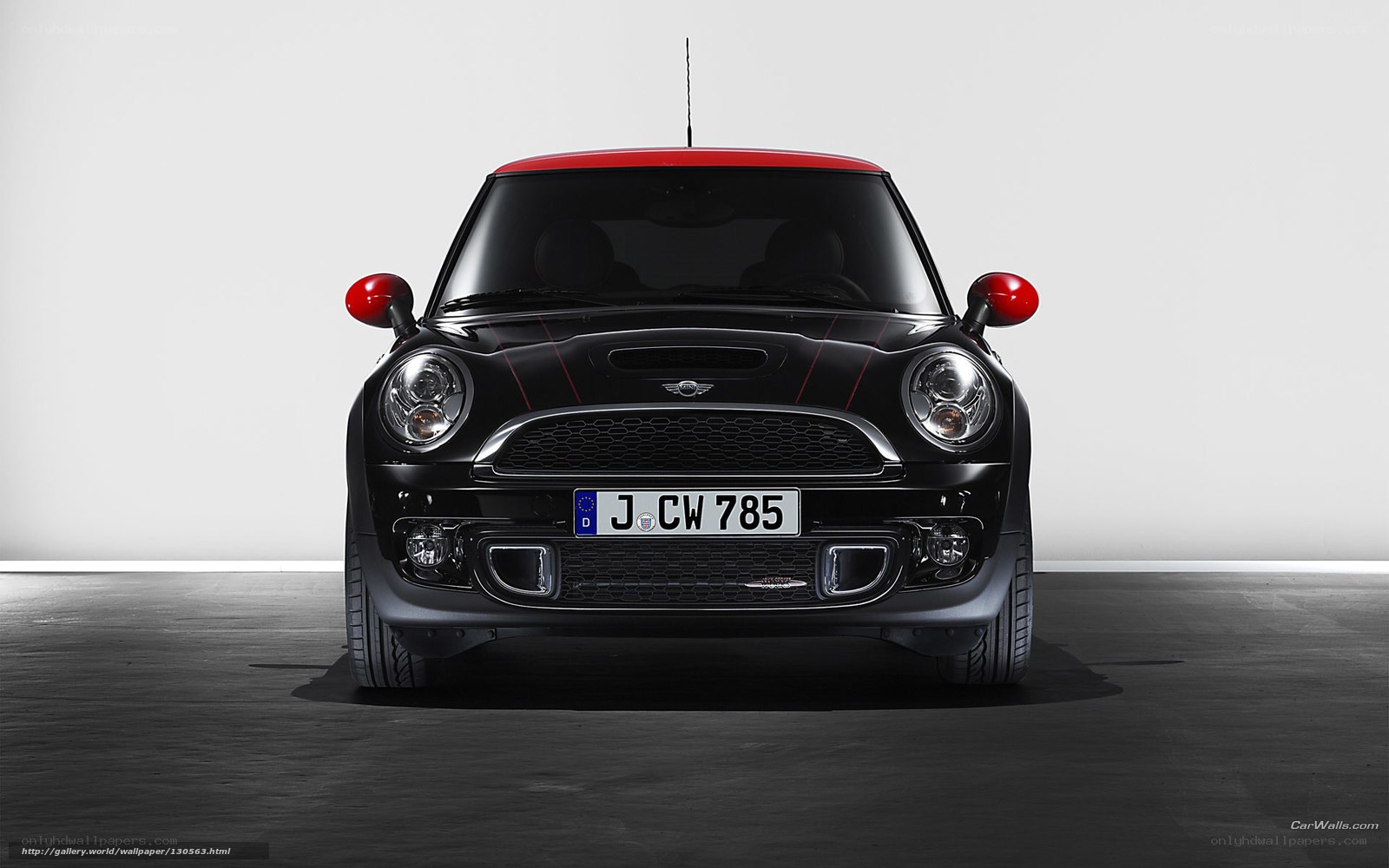 black mini cooper with red accents