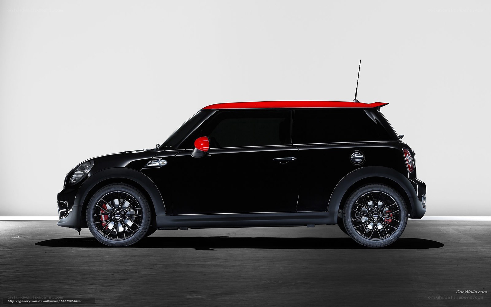 black mini cooper with red roof