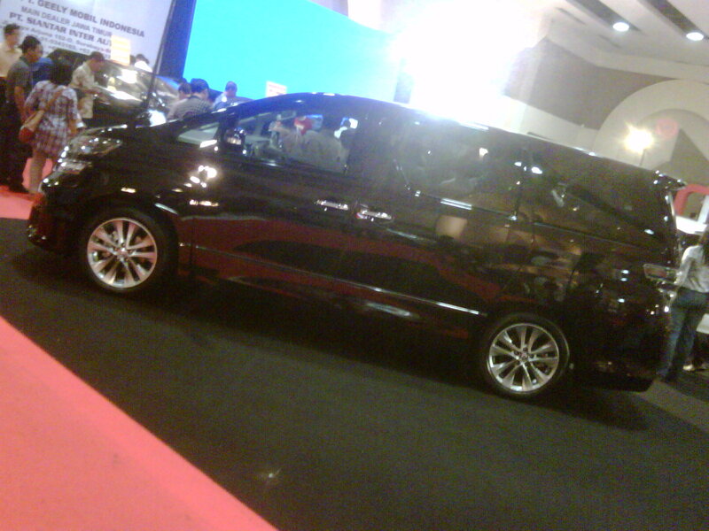 black minivan at auto show