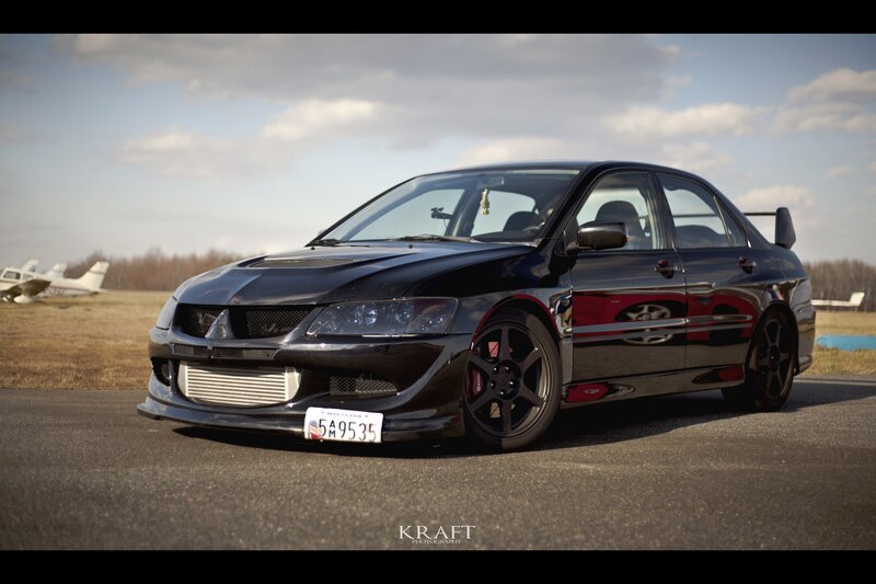 Black Mitsubishi Lancer — Dramatic, Afternoon, Photograph, Airplane