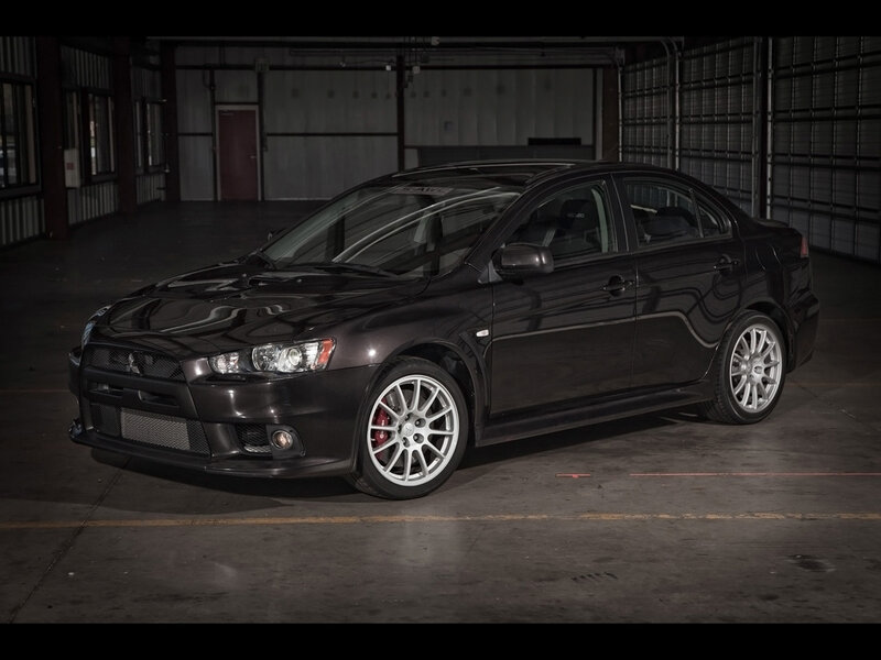 Black Mitsubishi Lancer — Dramatic, Photograph, Car, Garage