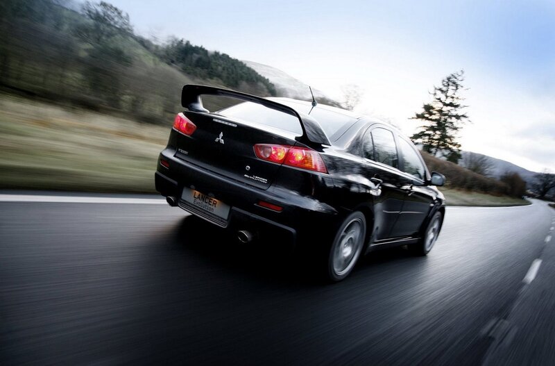 Black Mitsubishi Lancer — Dynamic, Afternoon