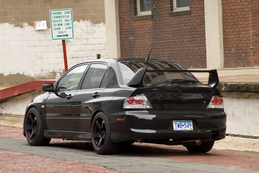 Black Mitsubishi Lancer Evolution parked