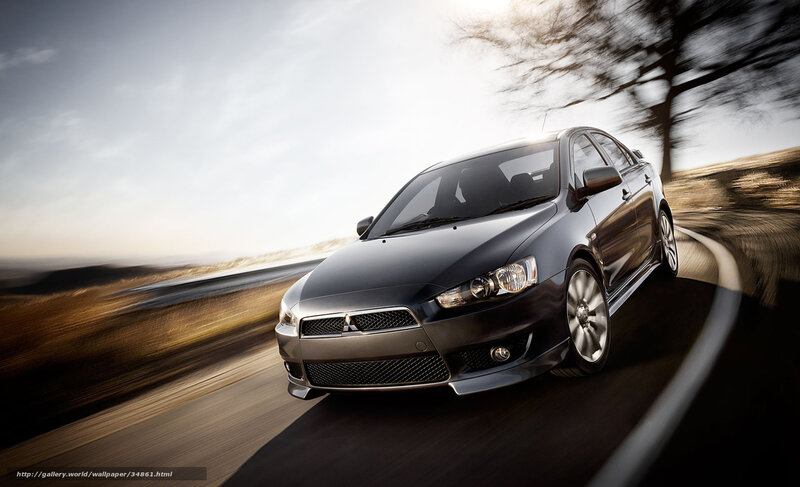 Black Mitsubishi on a winding road