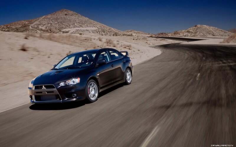 black mitsubishi on desert road