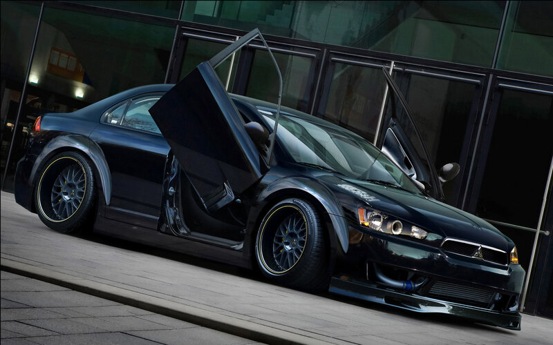 black mitsubishi with gullwing doors
