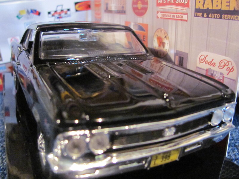 Black Model Car — Static, Photograph, Signs