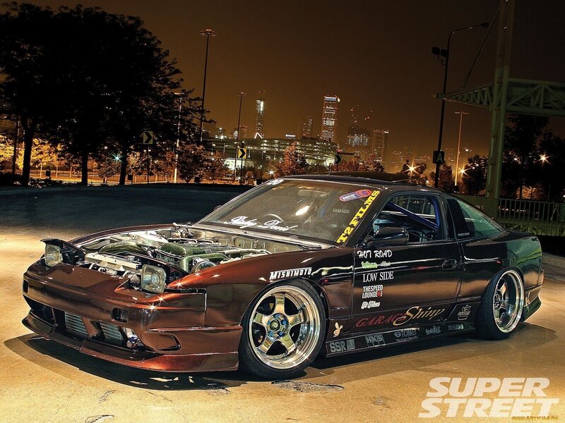 Black Modified Car — Dramatic, Night, Photograph, City Skyline
