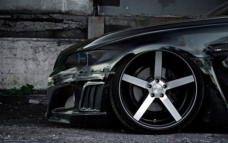 Black Modified Car — Dramatic, Photograph, Wheel, Fender, Concrete Wall