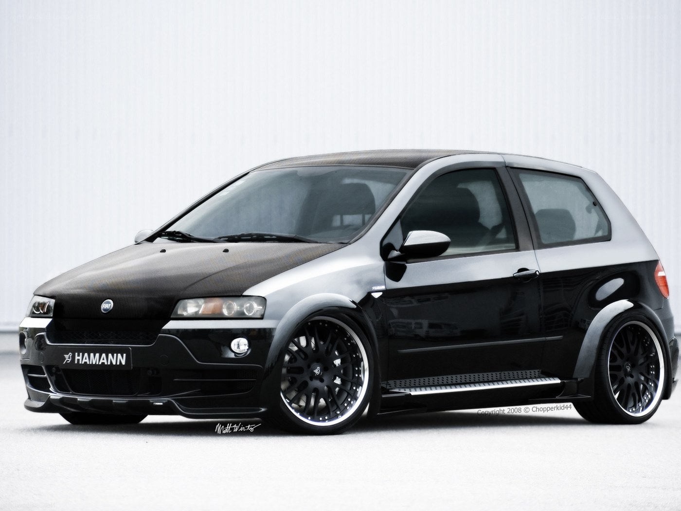 black modified hatchback car