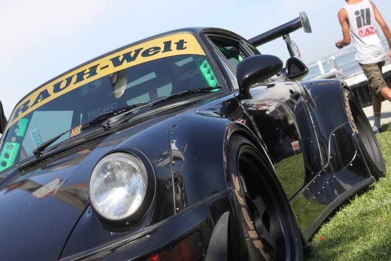Black modified Porsche at car show