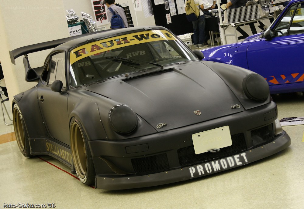 black modified porsche at show