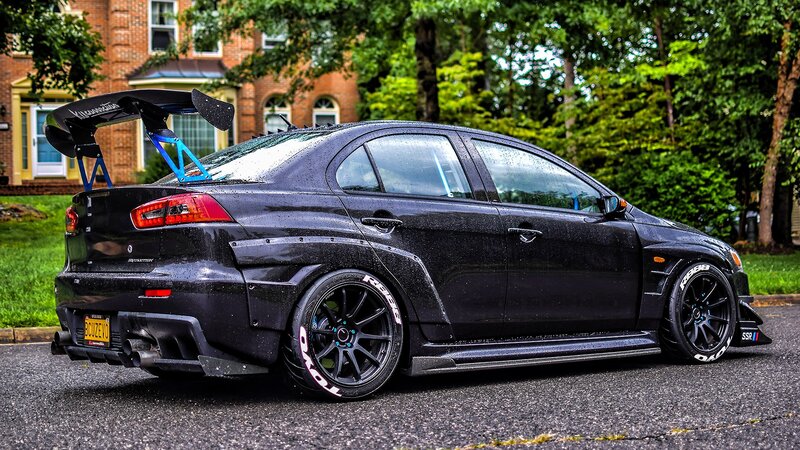 Black Modified Sedan — Dramatic, Afternoon, Photograph, Car, House
