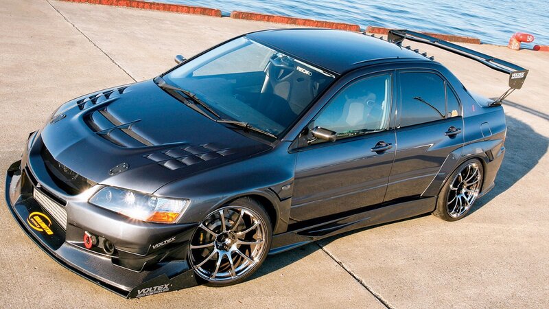 Black Modified Sedan — Dramatic, Afternoon, Photograph, Car, Water