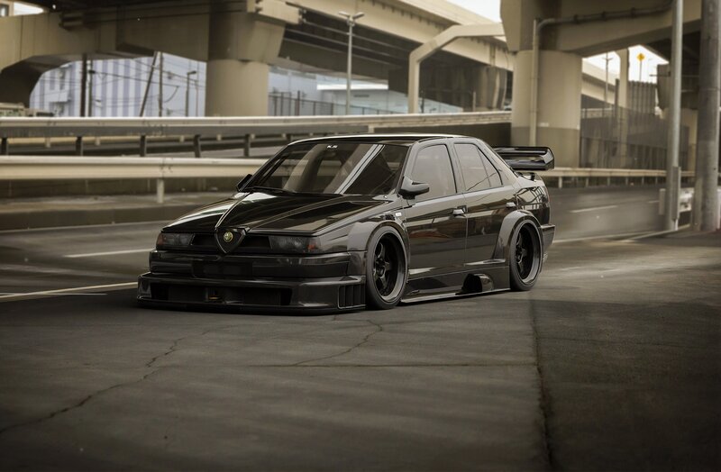 Black Modified Sedan — Dramatic, Afternoon, Photograph, Highway