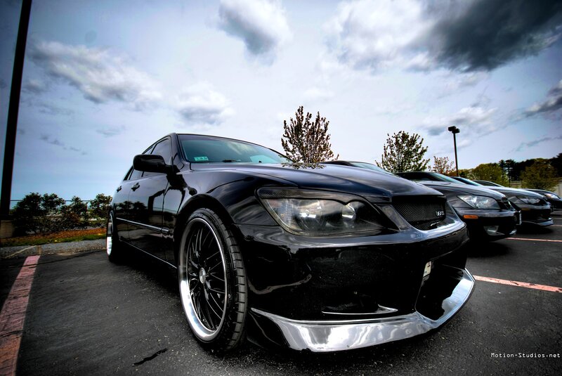 Black Modified Sedan — Dramatic, Afternoon
