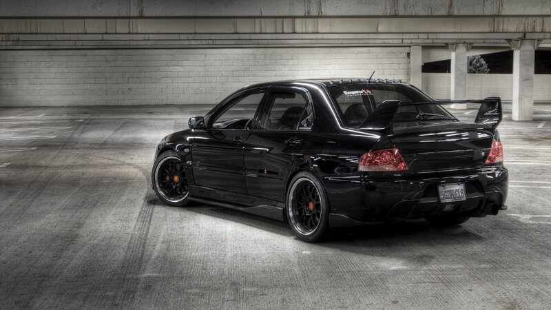 Black Modified Sedan — Dramatic, Photograph, Car, Parking Garage
