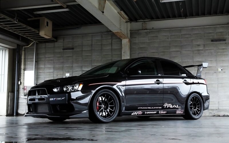 Black Modified Sedan — Dramatic, Photograph, Tire