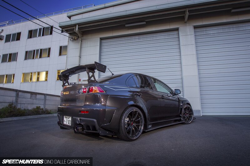 Black Modified Sedan — Dramatic, Sunset, Photograph, Car, Building