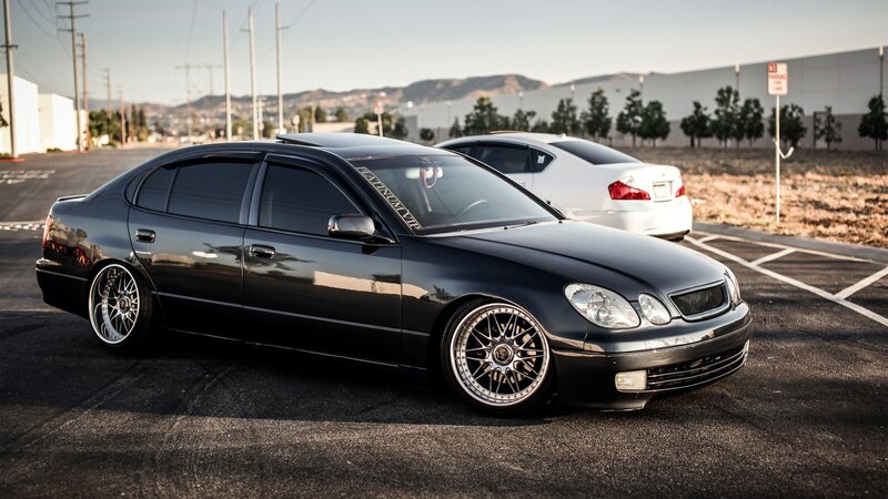Black Modified Sedan — Dramatic, Sunset, Photograph, White Car