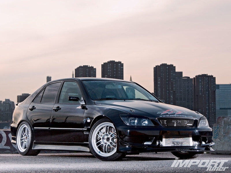 Black Modified Sedan — Dramatic, Sunset