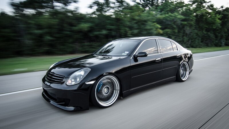 Black Modified Sedan — Dynamic, Afternoon, Photograph