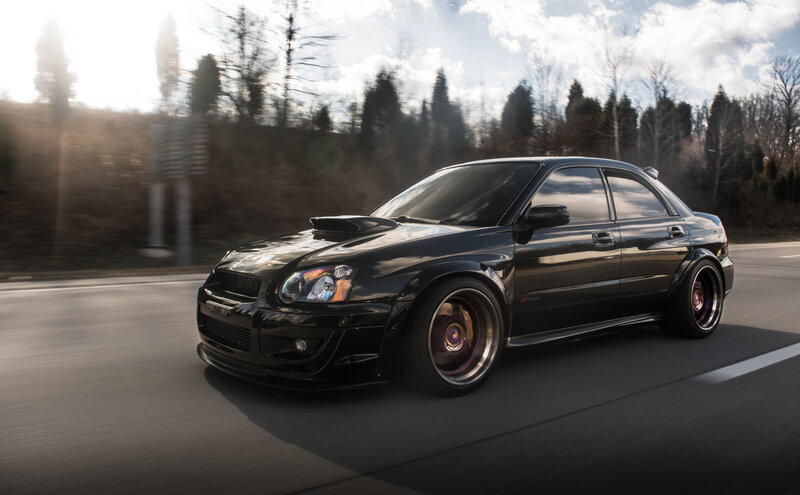 Black Modified Sedan — Dynamic, Afternoon