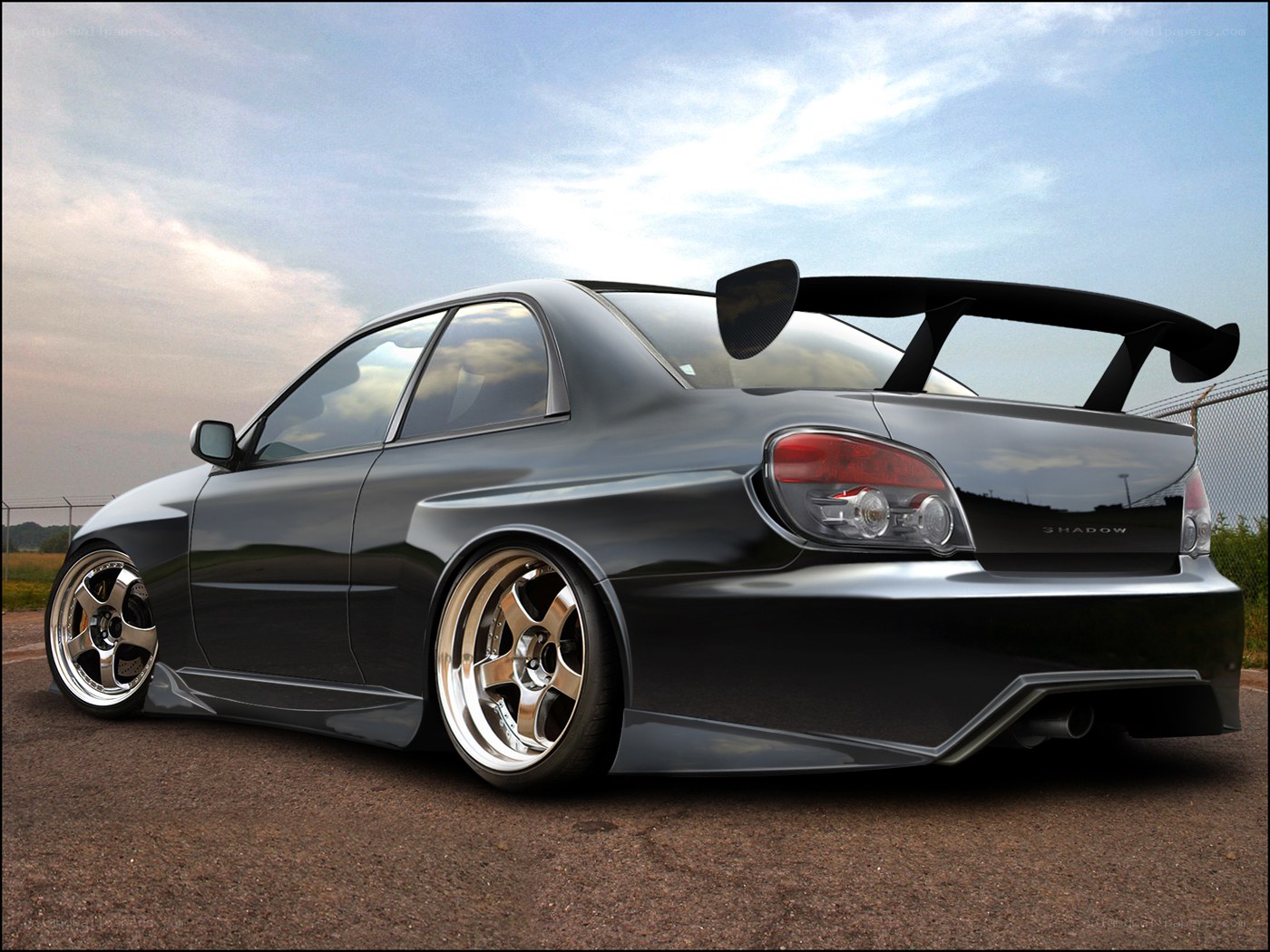 black modified sedan with spoiler