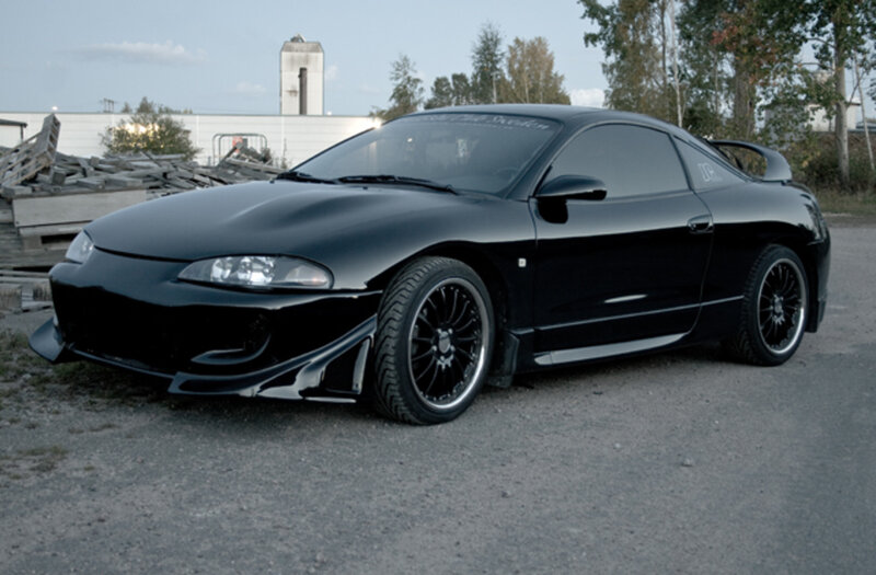 Black Modified Sports Car — Calm, Sunset