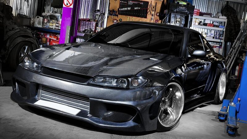 Black Modified Sports Car — Dramatic, Photograph, Garage, Car Lift