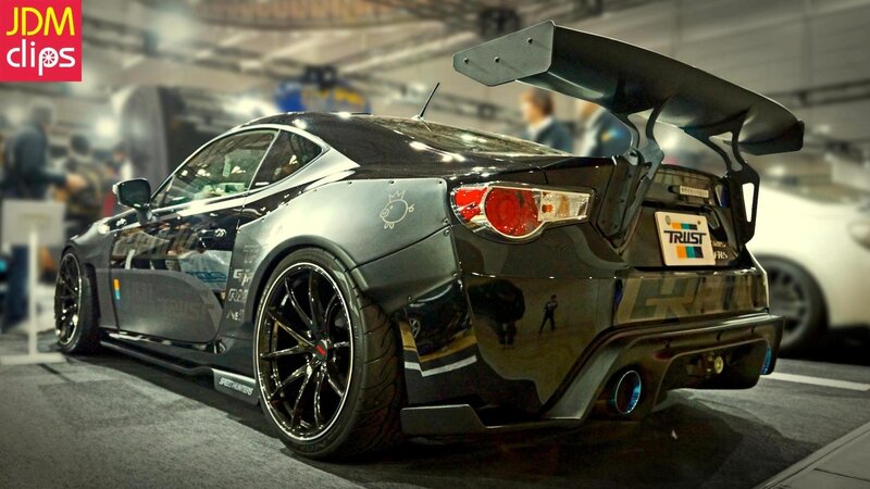 Black Modified Sports Car — Dramatic, Photograph, Tire