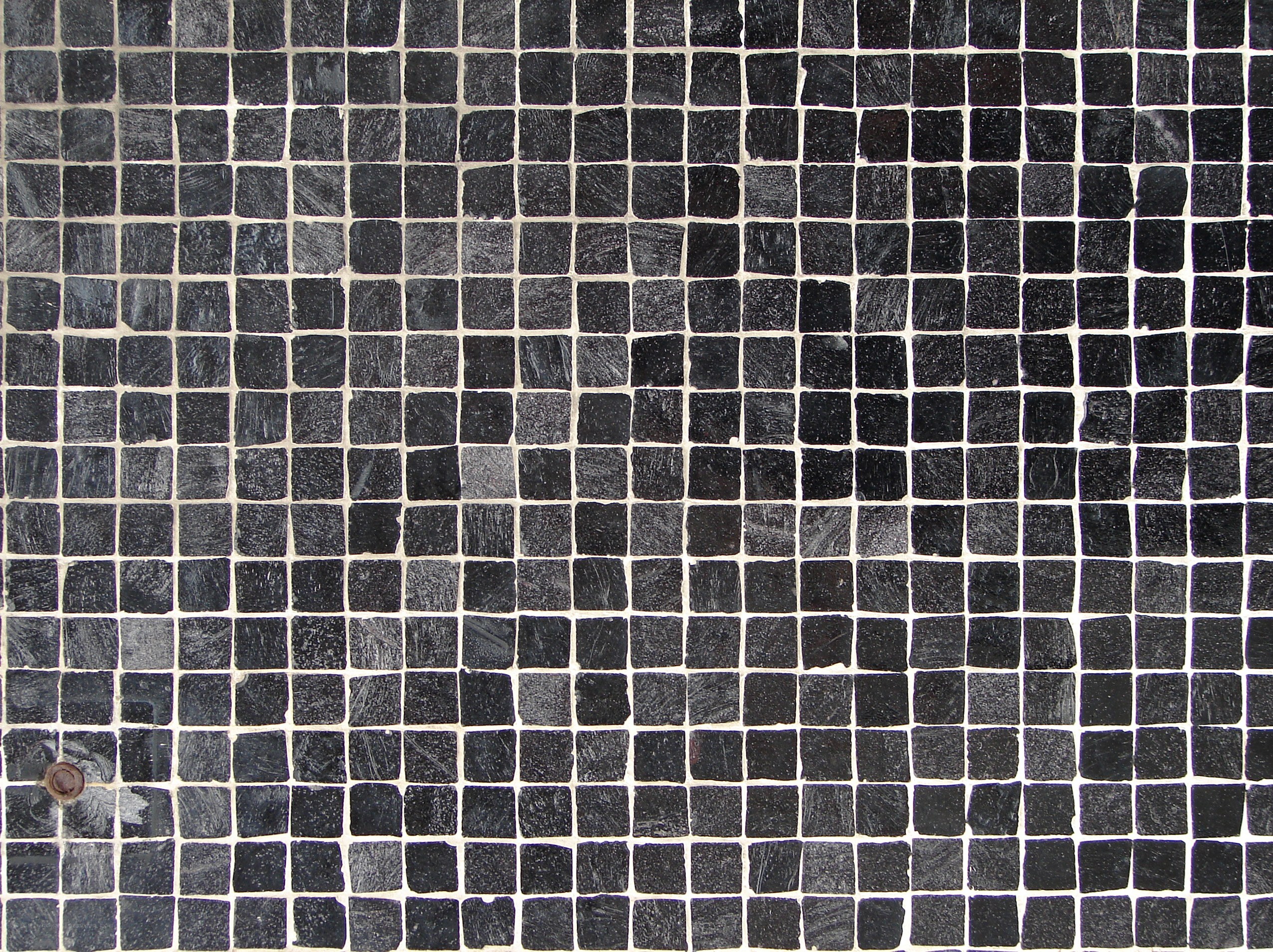 black mosaic tile pattern
