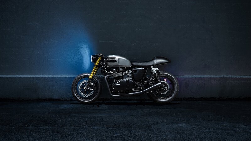 Black Motorcycle Against Wall