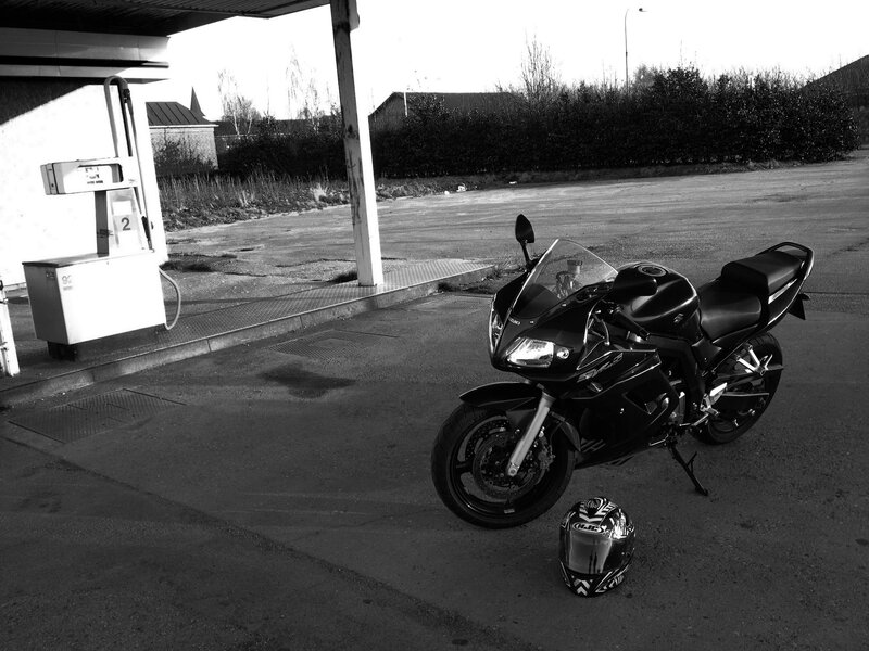 Black Motorcycle at Gas Station