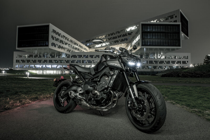 Black Motorcycle at Night — Dramatic, Photograph, Building
