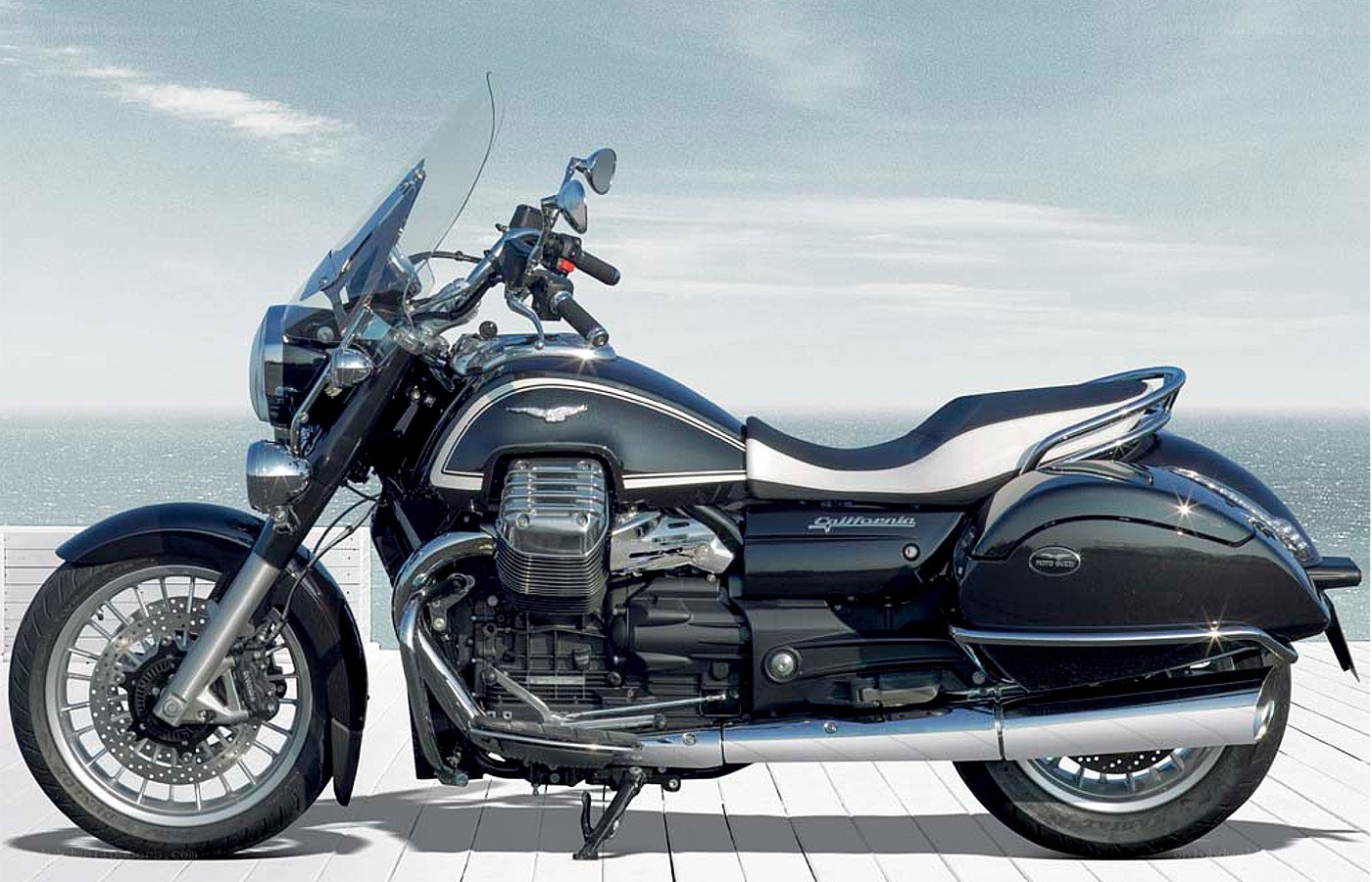 Black motorcycle by the sea