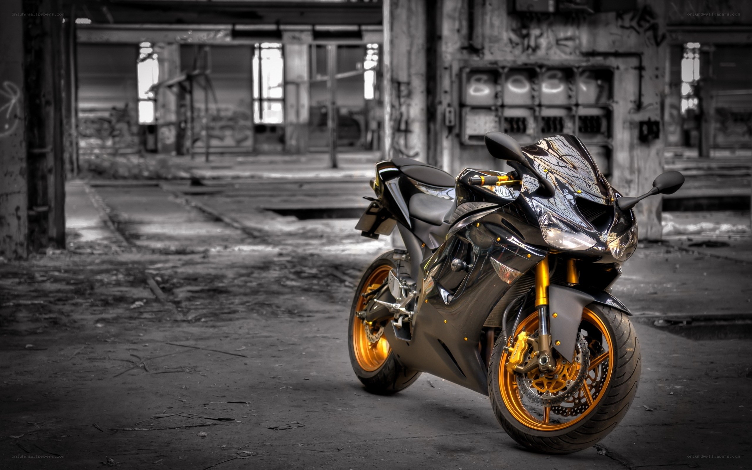 Black motorcycle in abandoned building