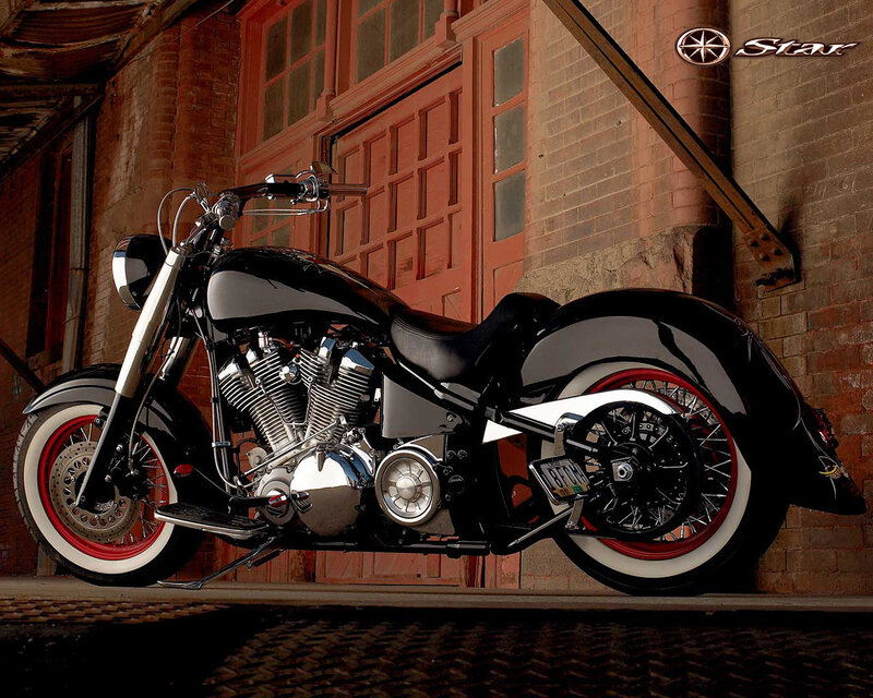 Black motorcycle in brick alley