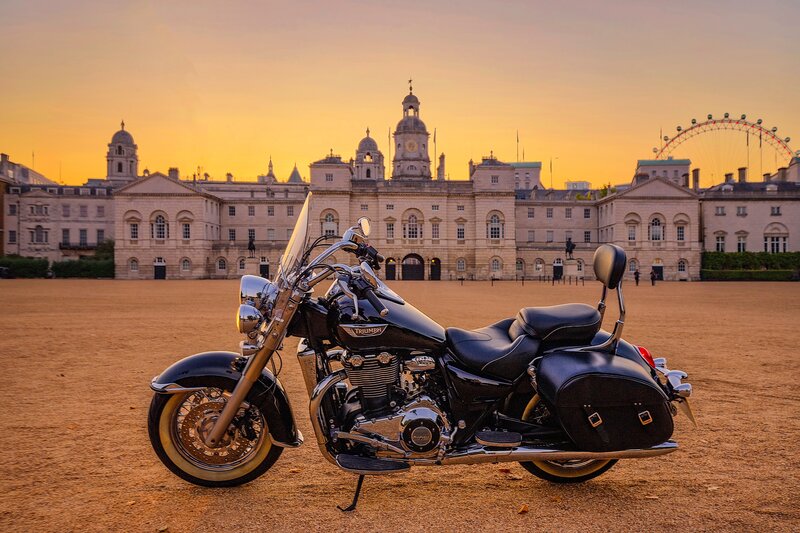 Black Motorcycle in Courtyard — Orange