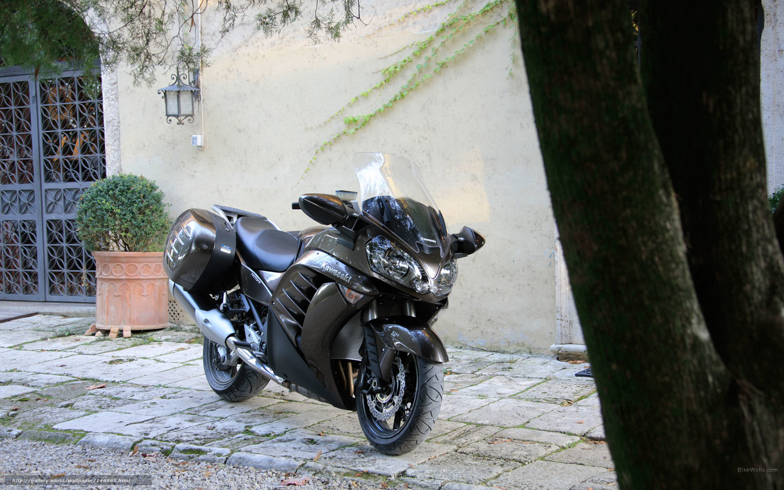 Black motorcycle in courtyard